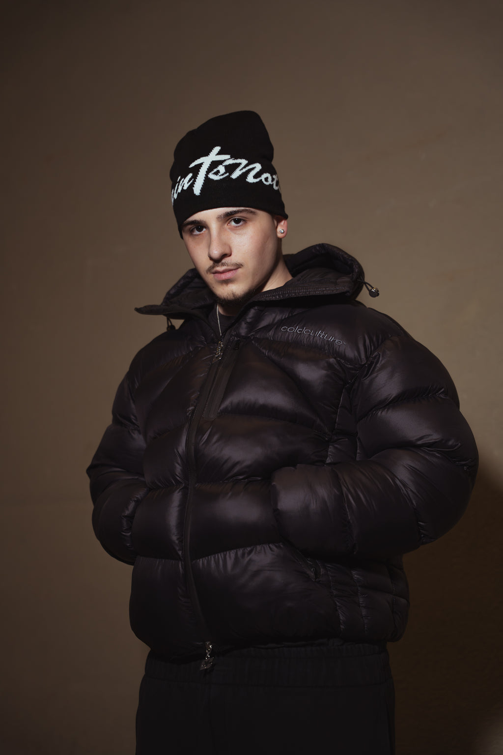 'UNSHAKEN' Black satin lined beanie