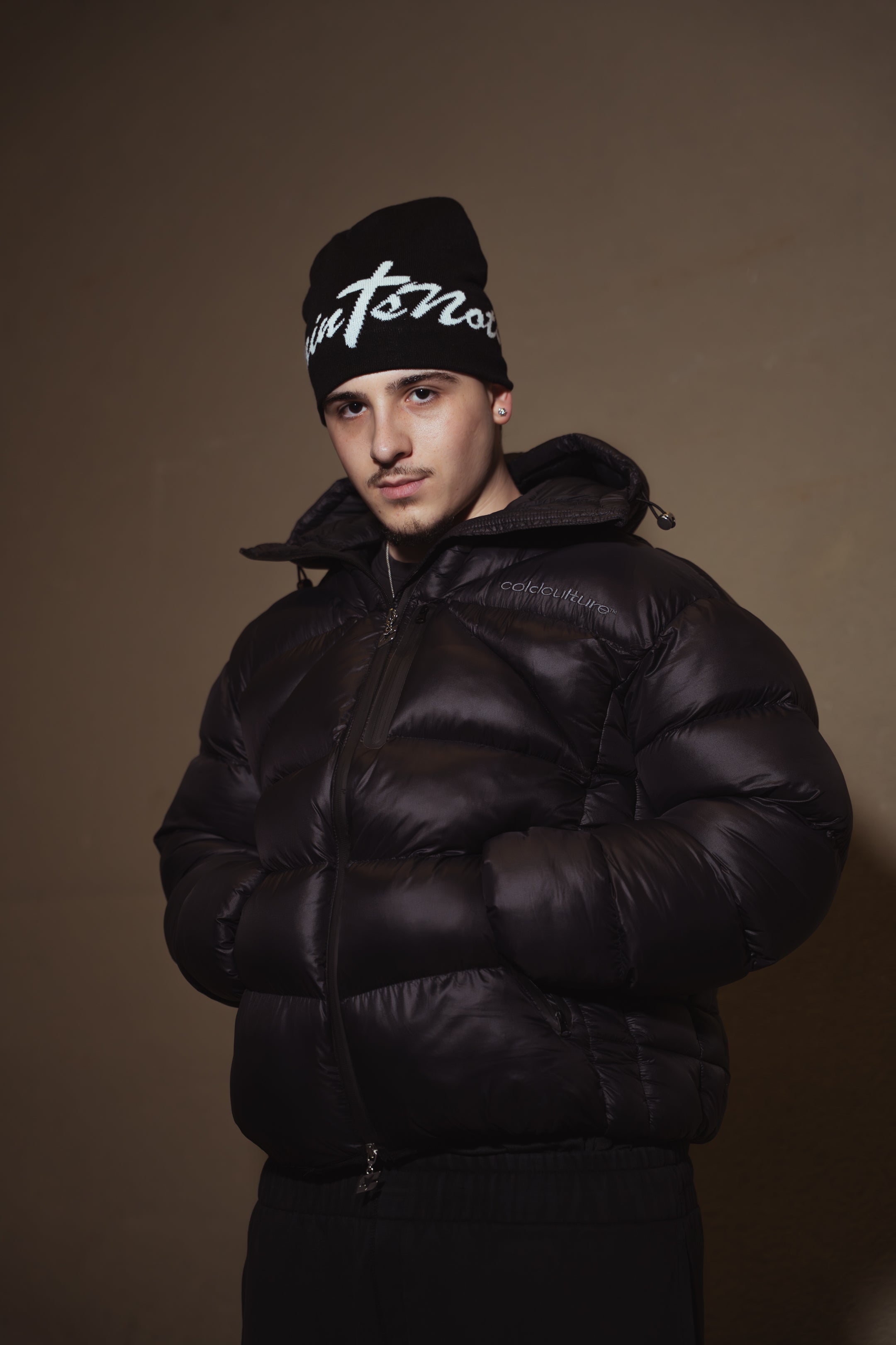 'UNSHAKEN' Black satin lined beanie